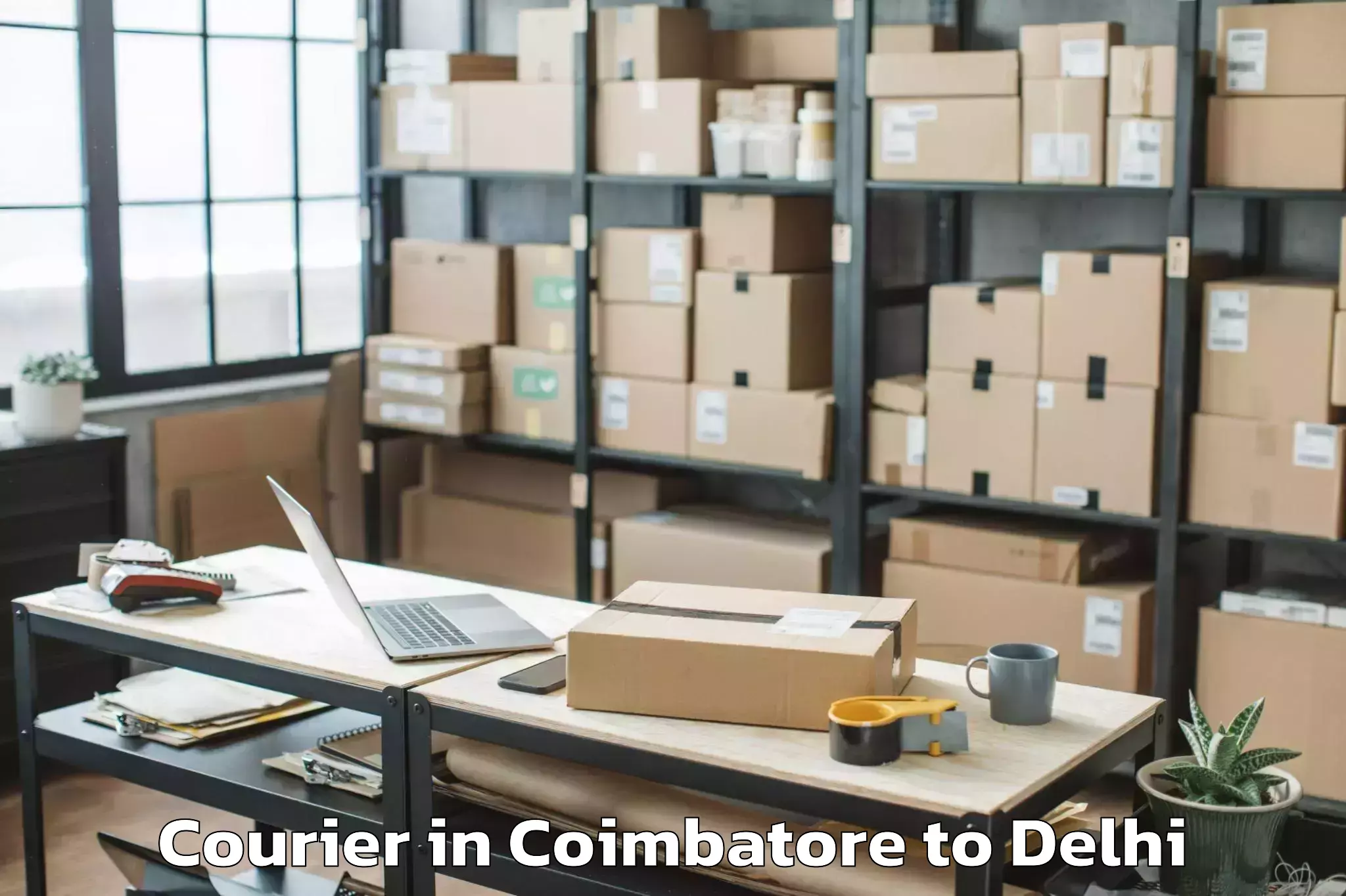 Book Coimbatore to Naraina Industrial Estate Courier